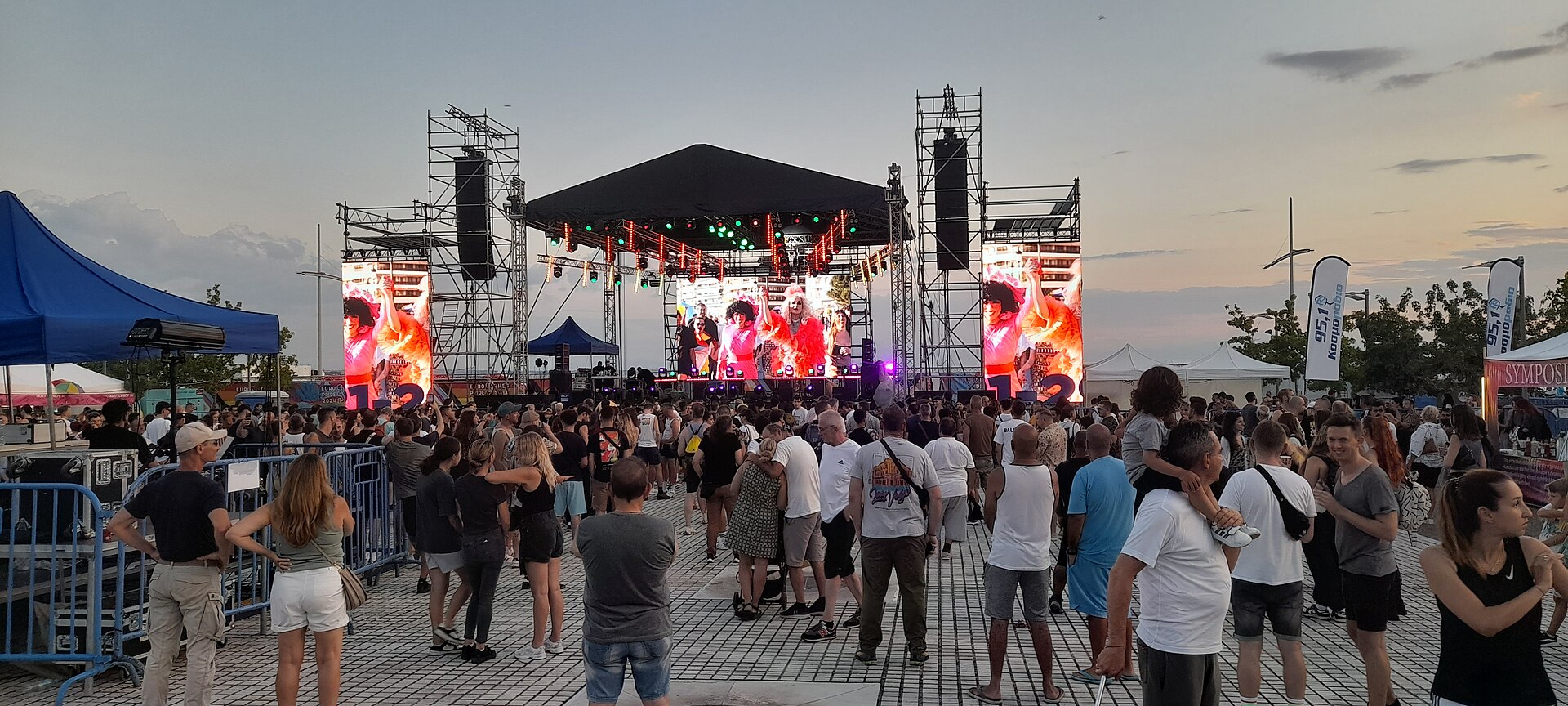 Concert crowd facing a live stage
